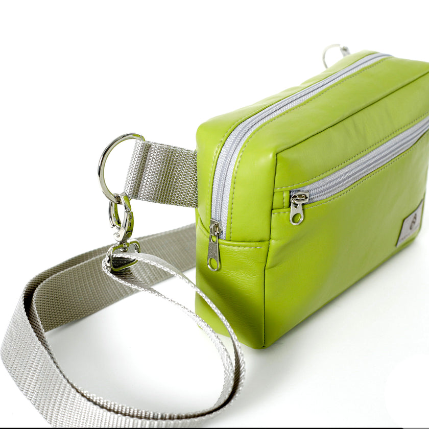 A gray strap with silver-toned hardware bag named after Nadine