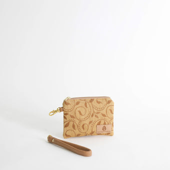 Beige patterned clip pouch with a strap on a white background
