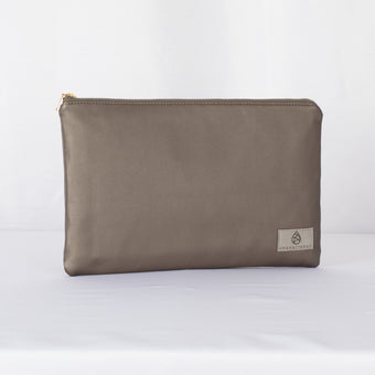 A large zip pouch in dark gray premium luxury leather alternative with a gold-tone hardware zipper, displayed against a white background.
