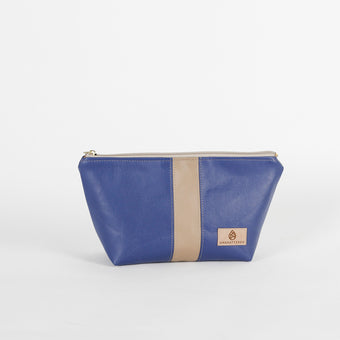 Blue southwest makeup bag with beige stripe and brand logo on a white background