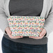 up close multicolor confetti puff plush makeup kit with a gray label named after Stasia