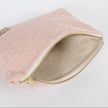 a beige luxury leather alternative interior on this pink and yellow zip pouch named after Susan 