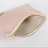 a beige luxury leather alternative interior on this pink and yellow zip pouch named after Susan 