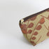 Fabric pouch with brown leaf pattern on a white background named after Tapeka 