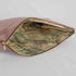A floral pattern interior on this mauve velvet exterior and gold tone zipper 