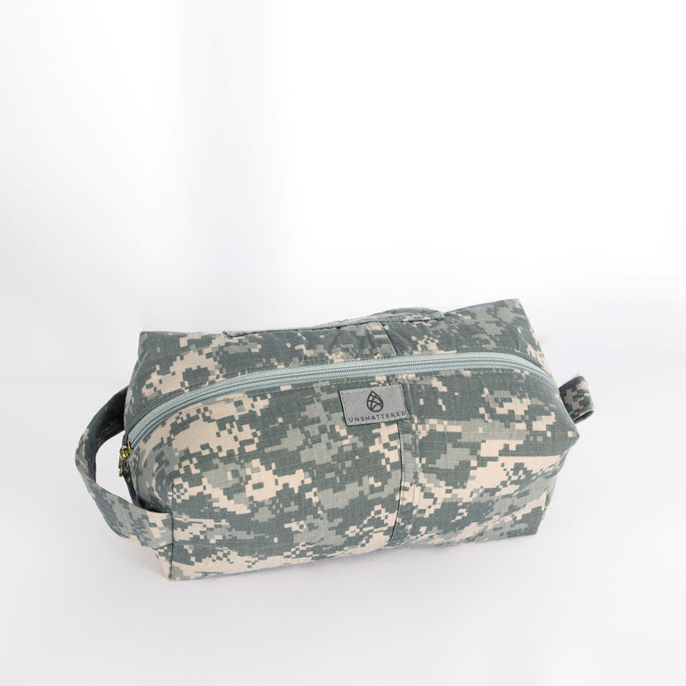 Camouflage toiletry bag on a white background