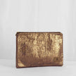A shimmery purple large zip pouch with gold-tone hardware, handcrafted from upcycled materials.