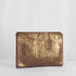 A shimmery purple large zip pouch with gold-tone hardware, handcrafted from upcycled materials.
