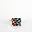 Multicolored checkered pouch with a strap on a white background