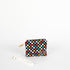 Multicolored checkered pouch with a strap on a white background