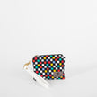 Small black, blue, red, yellow and white checkered zippered pouch with white leather alternative wristlet strap
