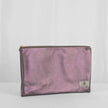 A shimmery purple and gray luxury leather alternative zip pouch with gold-tone hardware, displayed against a neutral background.