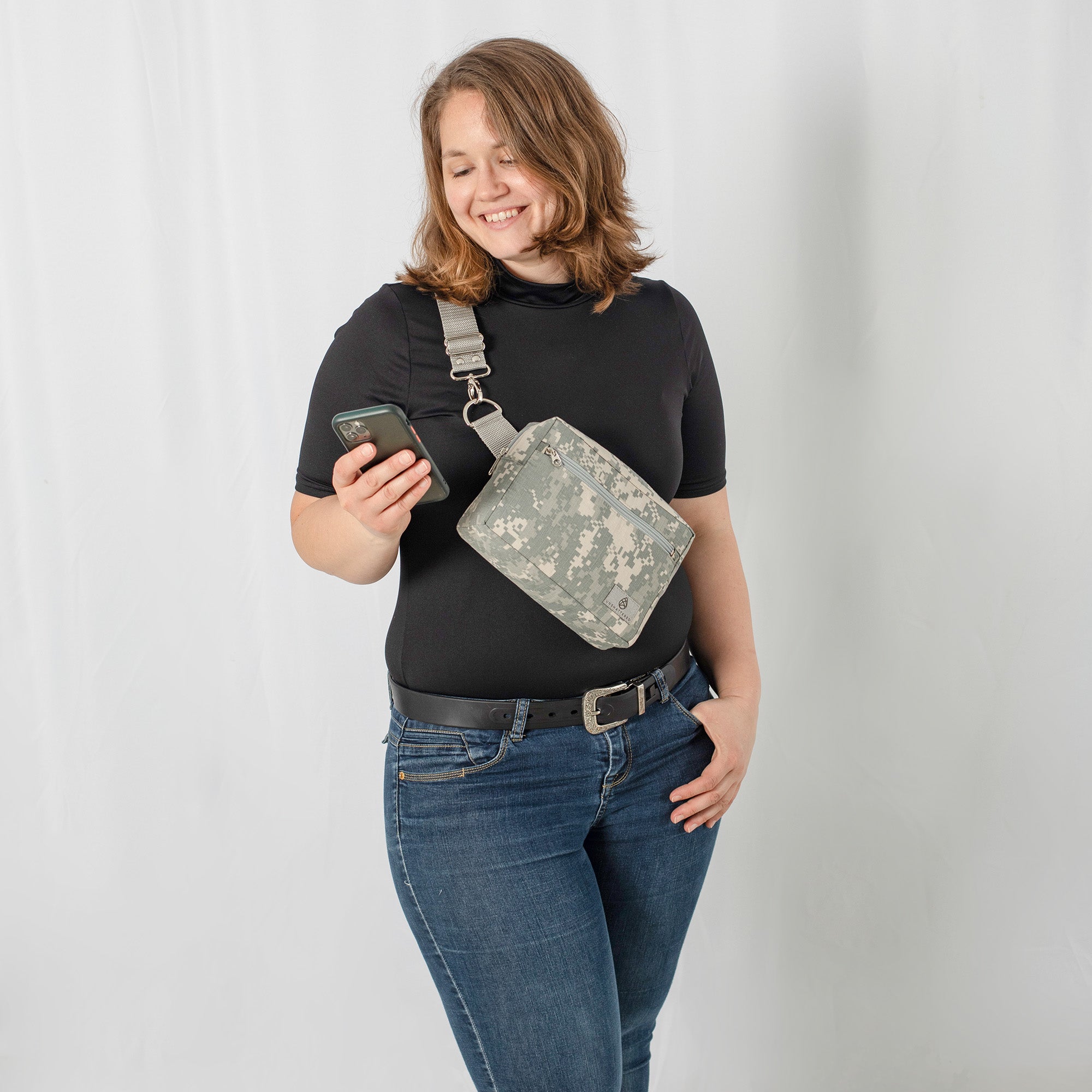 Upcycled US Army Uniform Errand Bag worn across the body of a woman