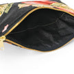 Upcycled black fabric interior of a floral-patterned fabric pouch named Gloryann 