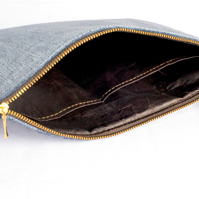Upcycled brown fabric interior of a blue velvet large zip pouch named after Laura