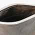 A brown luxury leather alternative interior with a gold seam on the inside of a makeup bag