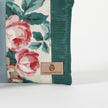 A tan label on a multi-panel crossbody named after Nadiya 