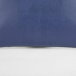 A detail shot of the Unshattered embossed on the back of the anniversary bag