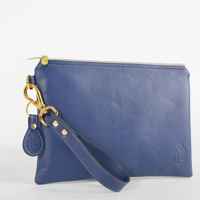 A detail shot of the wristlet and gift with purchase keychain.