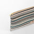 A detail shot of the gold tone zipper on this multicolor zip pouch 