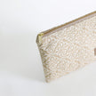 Patterned pouch with a zipper on a white background