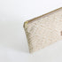 Patterned pouch with a zipper on a white background