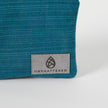 Blue textured product with 'Unshattered' brand label on a white background
