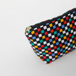 Colorful checkered makeup bag with a gold zipper on a white background named after Luisa 
